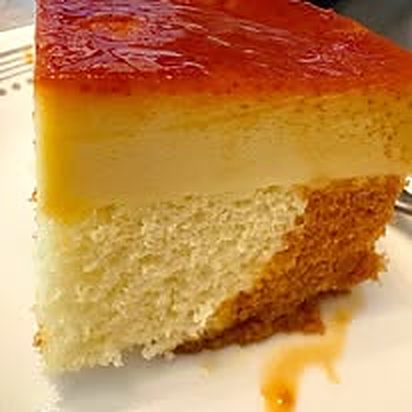 Slice of custard-topped sponge cake
